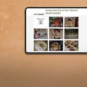 Tablet showing alive Connect page with featured wellness articles for natural health retailer customers.