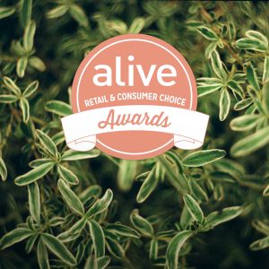 alive Awards of natural health logo on a green background.